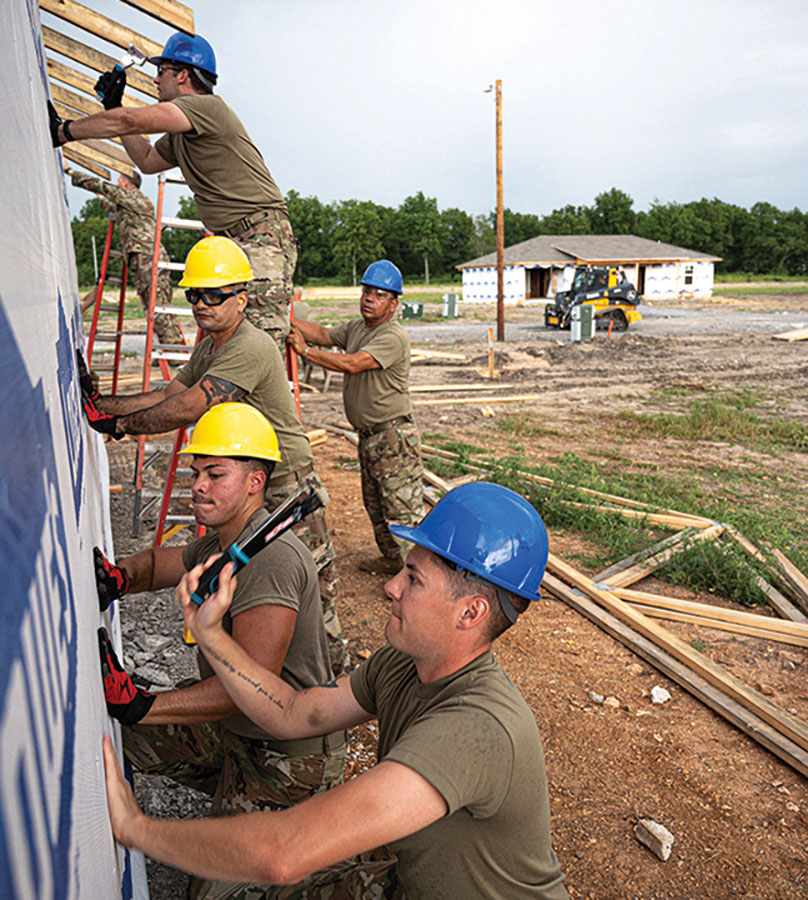 Members of the 126th Civil Engineer Squadron and 301st CES help build a house in Tahlequah, Oklahoma.