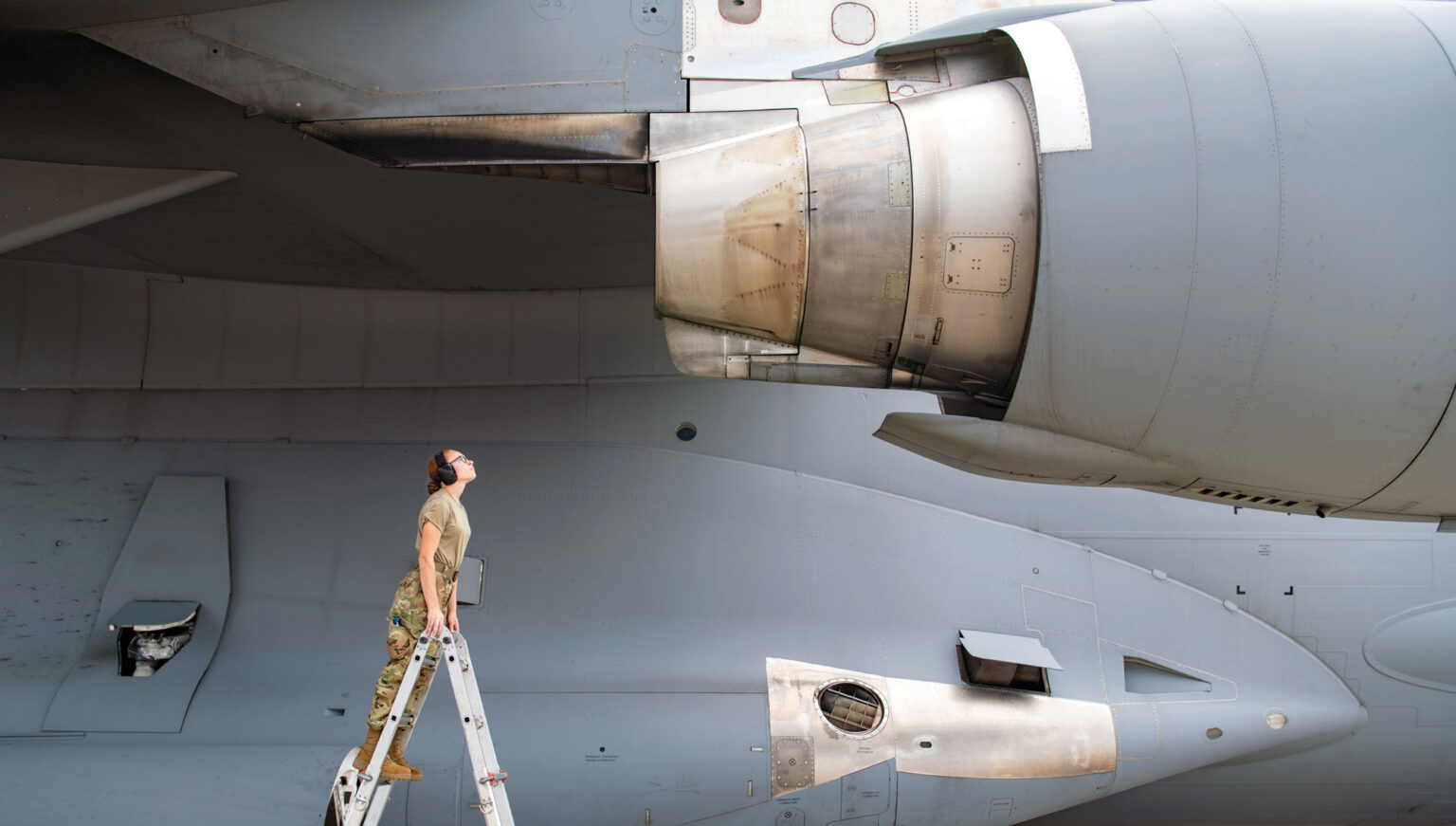 Senior Airman Grace Tupper, a crew chief with the Mississippi Air National Guard’s 172nd Maintenance Group inspects the engine of a C-17 Globemaster III transport aircraft after a training mission at Air Station Barbers Point near Honolulu, Hawaii, July 12. Her unit was among those training in Hawaii in July to keep the 172nd Airlift Wing’s global mission running smoothly.