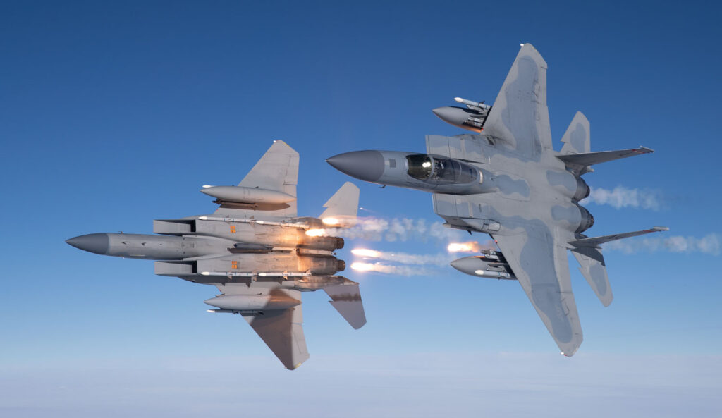 Pilots with the Oregon Air Guard’s 142nd Fighter Wing discharge defensive flares during training over the Pacific Ocean.